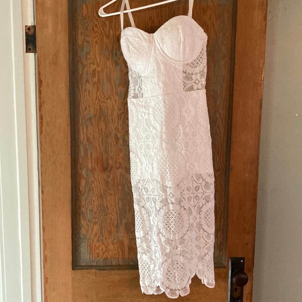 A Bebe lace knee length dress    Classy and sexy
